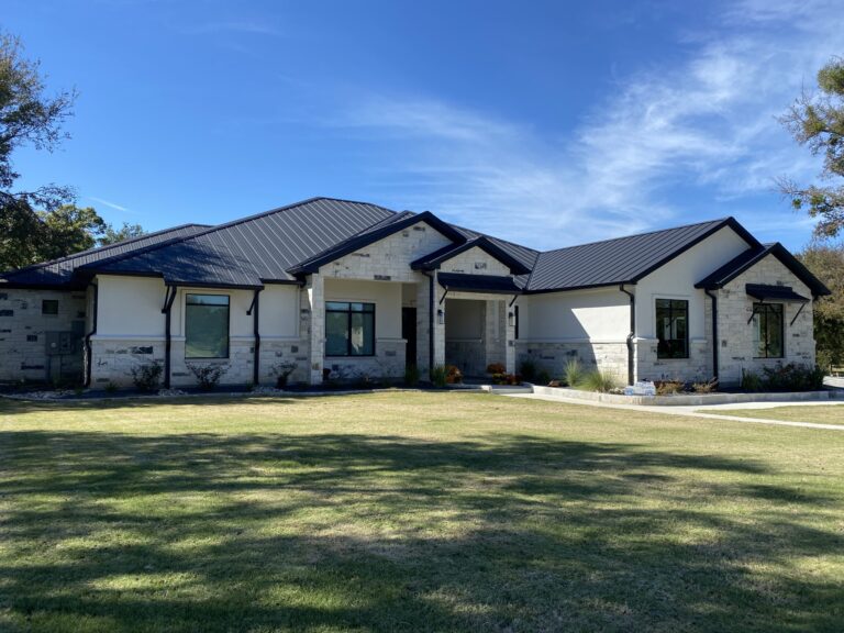 Black standing seam roof in Salado, TX.